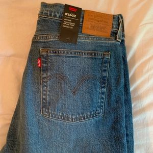 Levi’s - wedgie fit size 31 - no stretch so run on the smaller side - nwt